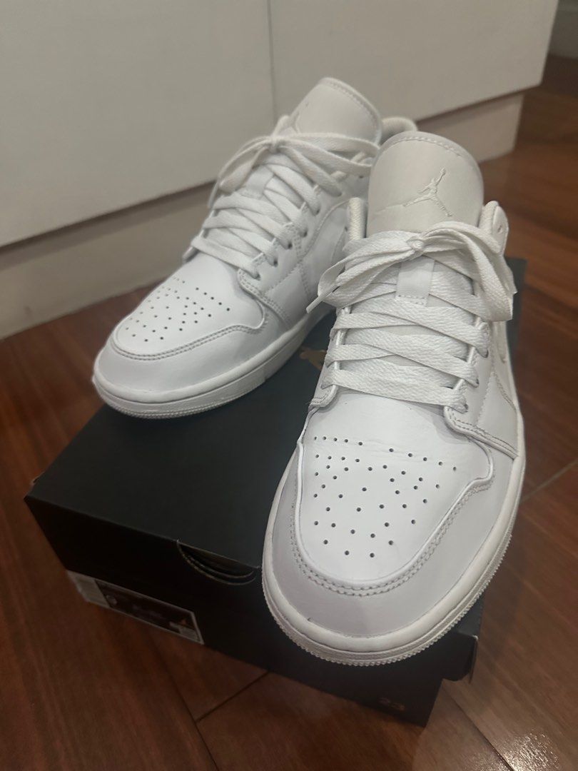 Air Jordan 1 Low “Triple White” (Category: Sneakers) located in Taguig. Submitted by clsaint (Listing ID 1333037640, Image 2). Description: Bought in Atmos Japan. Comes with original box. Size US 9. Rarely used, almost new.