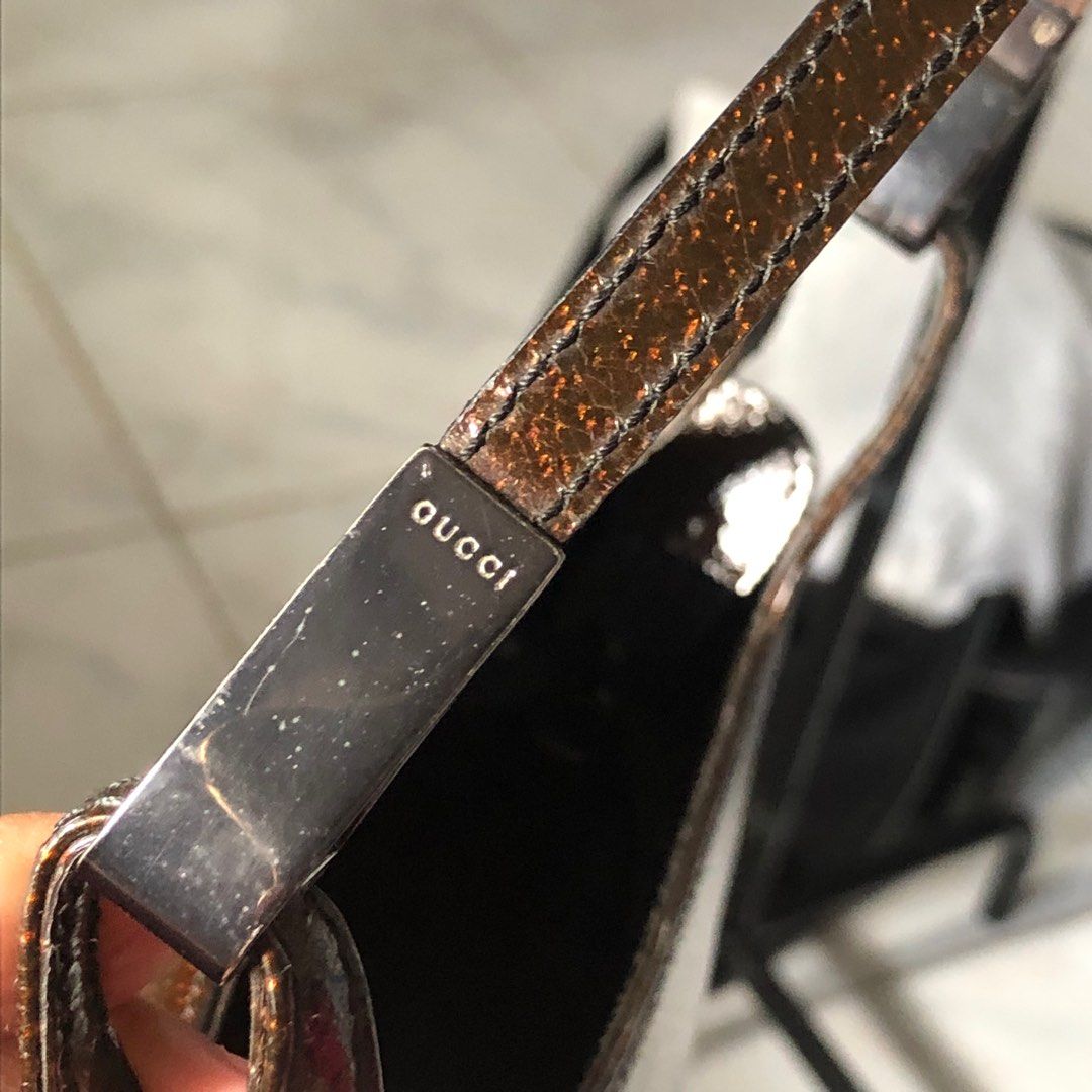 Authentic Gucci Pig skin Handheld Brown Bag (Category: Luxury Bags & Wallets) located in Calamba. Submitted by ilablue (Listing ID 1333027313, Image 3). Description: No scratches or cracks of leather outside Flaws seen in last 3 pictures. Ganyan po talaga pag vintage/old gucci. Peeling of inside material. Pero not powdery Measurements: 10in x 6in x 3in.