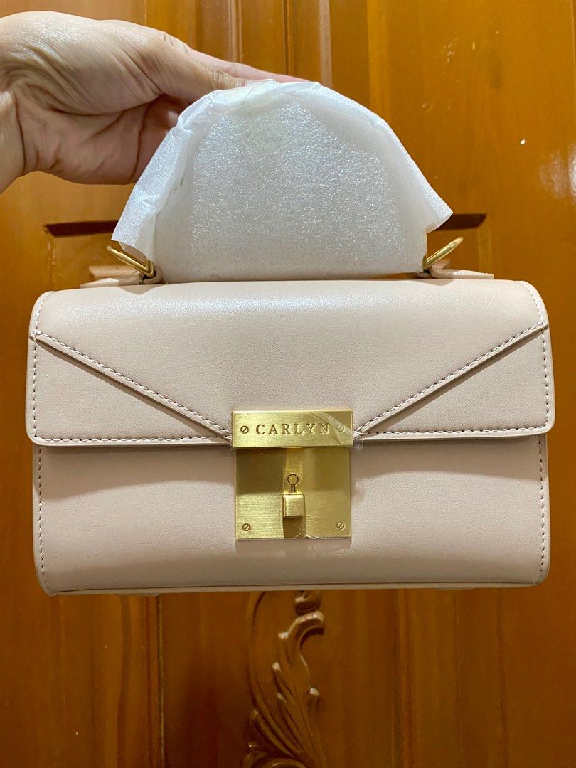 Carlyn Top-Handle Bag (Category: Luxury Bags & Wallets) located in Bay. Submitted by baggsy416 (Listing ID 1333126889, Image 2). Description: Brand new Original Carlyn (Famous Korean Brand) Nude pink in color Leather material Matte gold hardware.