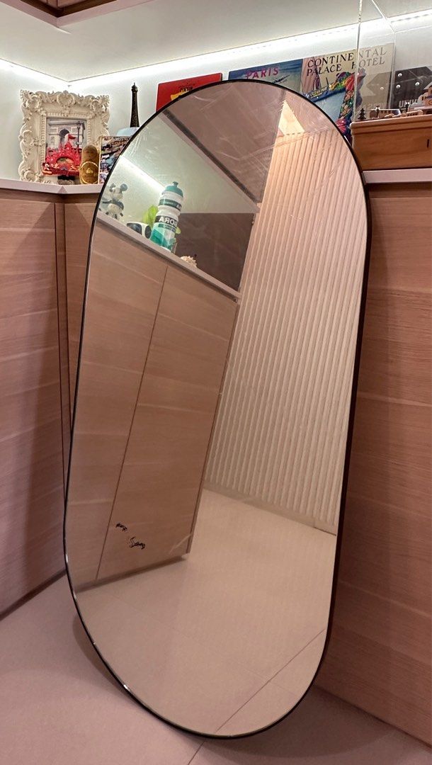 Customized Mirror Panel (Category: Other Home Furniture) located in Singapore. Submitted by shirlcsl (Listing ID 1333074166, Image 1). Description: Customized mirror panel in oval shape, with black metal frame. Dimension : 120cm x 60cm Never used before. Self collection. .