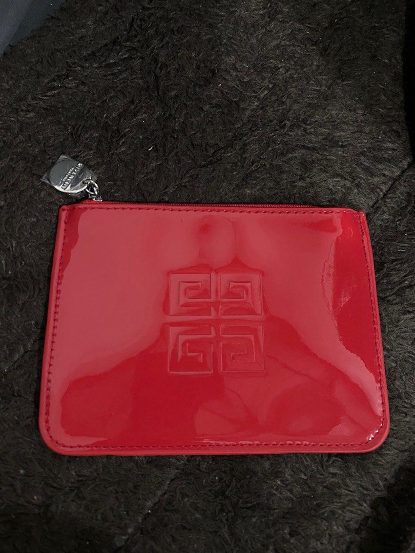 Givenchy Red coin purse (Category: Luxury Bags & Wallets) located in Malabon City. Submitted by brielles_online_trends (Listing ID 1332975839, Image 1). Description: Red coin purse Givenchy PETITE TROUSSE PLATE ROUGE SMALL FLAT RED POUCH ( parfum givenchy ) .