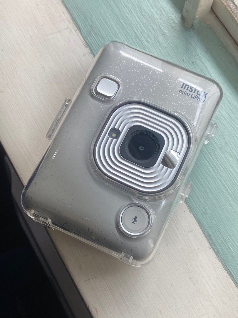 Instax Mini LiPlay (Category: Cameras) located in Quezon City. Submitted by 072500 (Listing ID 1333034822, Image 1). Description: Instax Mini LiPlay Complete inclusions: Pristine box, charger, camera, wrist strap, and clear resin case Barely used, stored well in closed cabinet. .