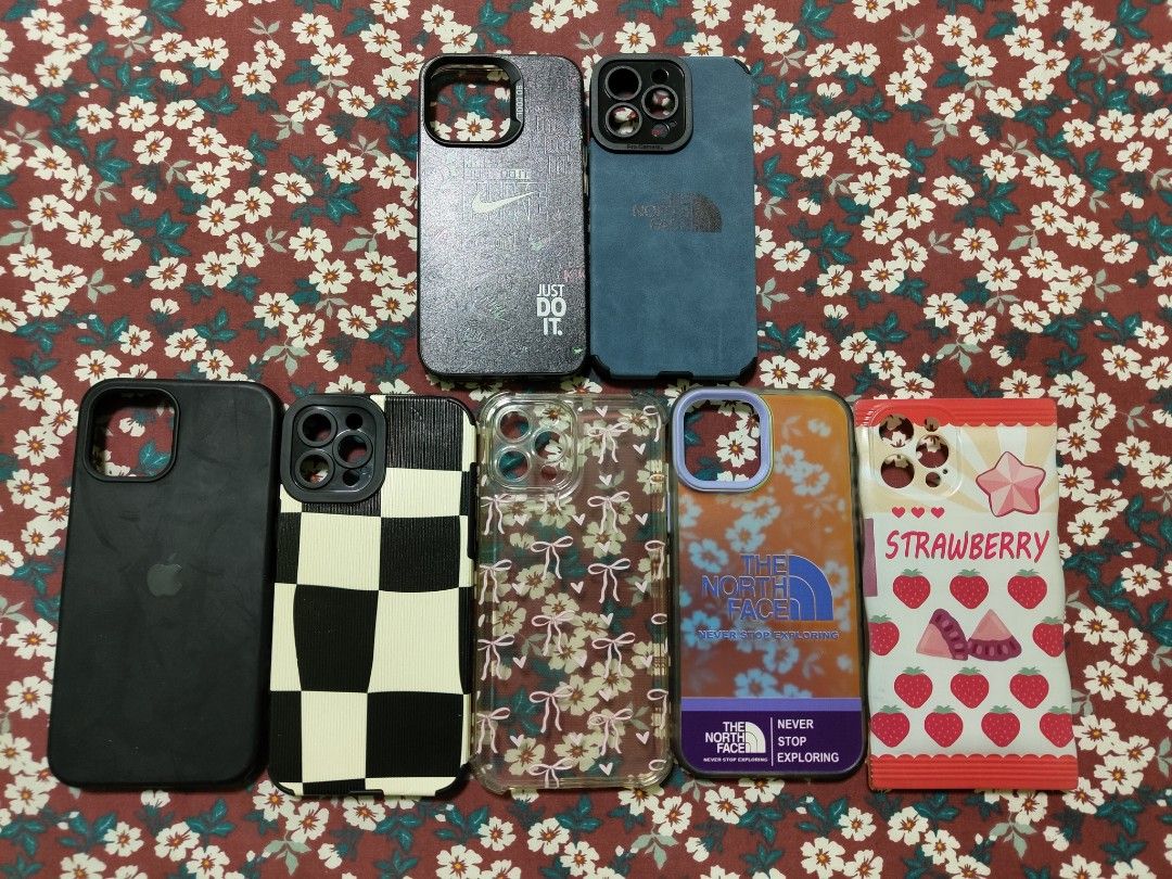 Iphone casing (Category: Cases & Sleeves) located in Singapore. Submitted by jumx98 (Listing ID 1333077763, Image 1). Description: iPhone 13 pro Nike case - $5 iPhone 13 pro The North Face case - $7 All iPhone 12 Pro Max cases are $5 each.