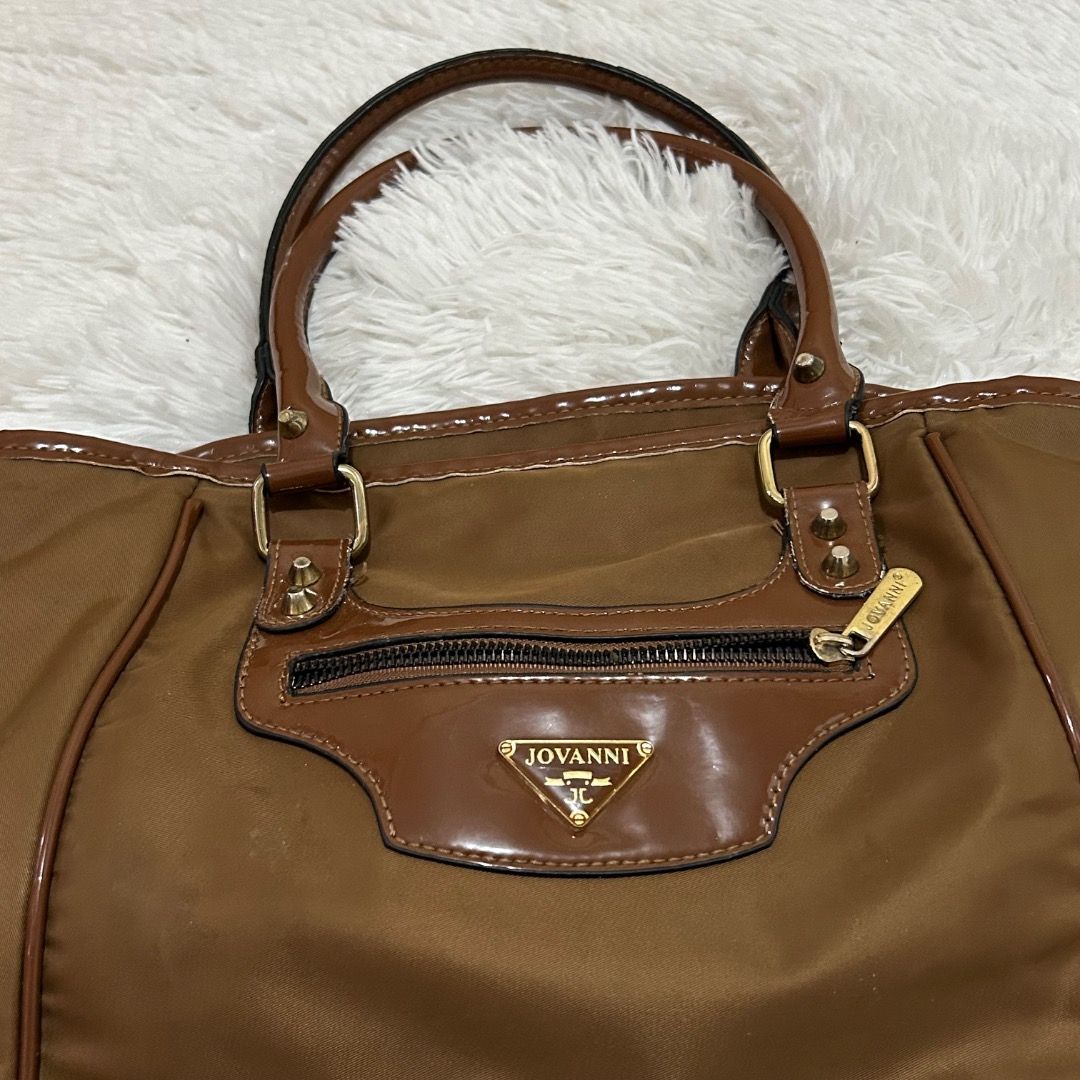 JOVANNI BROWN SHOULDER BAG (Category: Luxury Bags & Wallets) located in Naga. Submitted by starlightbyalli (Listing ID 1333052320, Image 2). Description: Brown Jovanni Bag Measurements: Drop: 7” Height: 10” Width: 15” Depth: 4” Flaw/s: - has small scratch sa may right front part - needs wash lang since nastock (not really dirty) MOP: Gcash/Bank transfer MOD: J&T/Flash .
