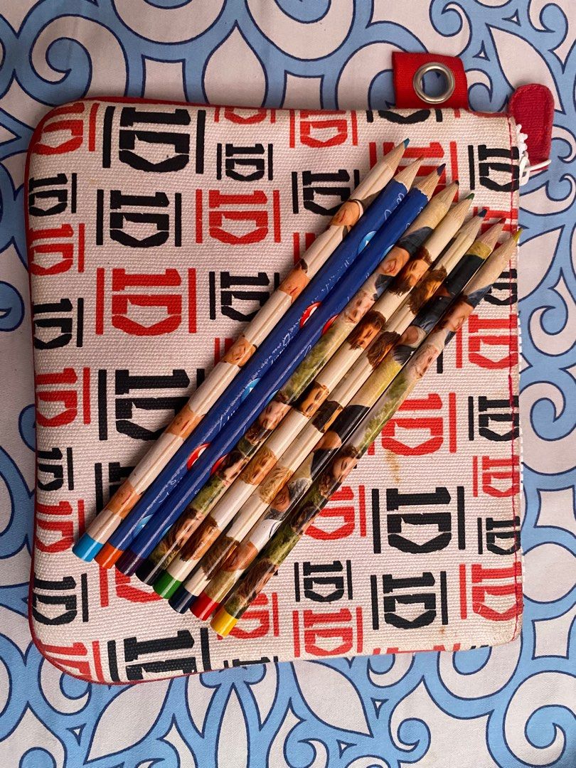 One Direction Pouch (Category: Stationery & School Supplies) located in Quezon City. Submitted by kirstengrace16 (Listing ID 1332984247, Image 2). Description: will include used one direction coloring pencils needs to be washed has a few stains.