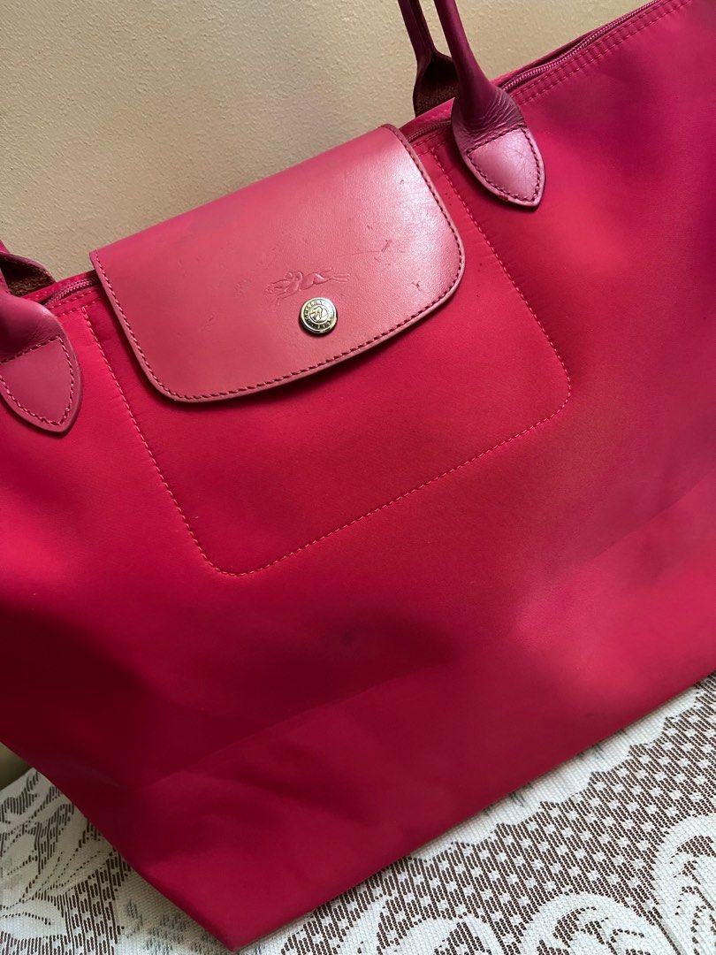 Longchamp Large Long Handle Bag not Lacoste Kipling (Category: Shoulder Bags) located in Cavite. Submitted by Junells_Nook (Listing ID 1333149254, Image 2). Description: With some signs of usage on the corners at the bottom but acceptable, pls see images for your reference: Long handle. YKK zip .