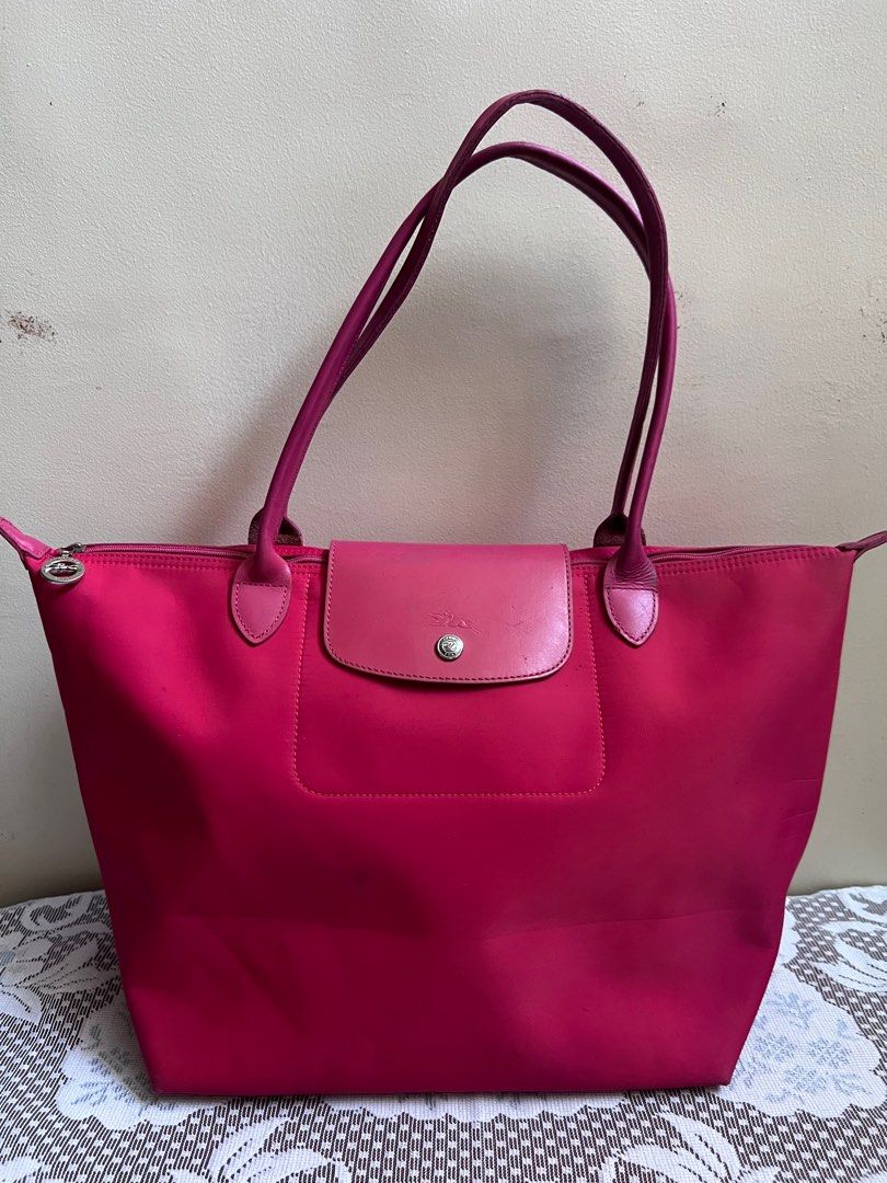 Longchamp Large Long Handle Bag not Lacoste Kipling (Category: Shoulder Bags) located in Cavite. Submitted by Junells_Nook (Listing ID 1333149254, Image 1). Description: With some signs of usage on the corners at the bottom but acceptable, pls see images for your reference: Long handle. YKK zip .
