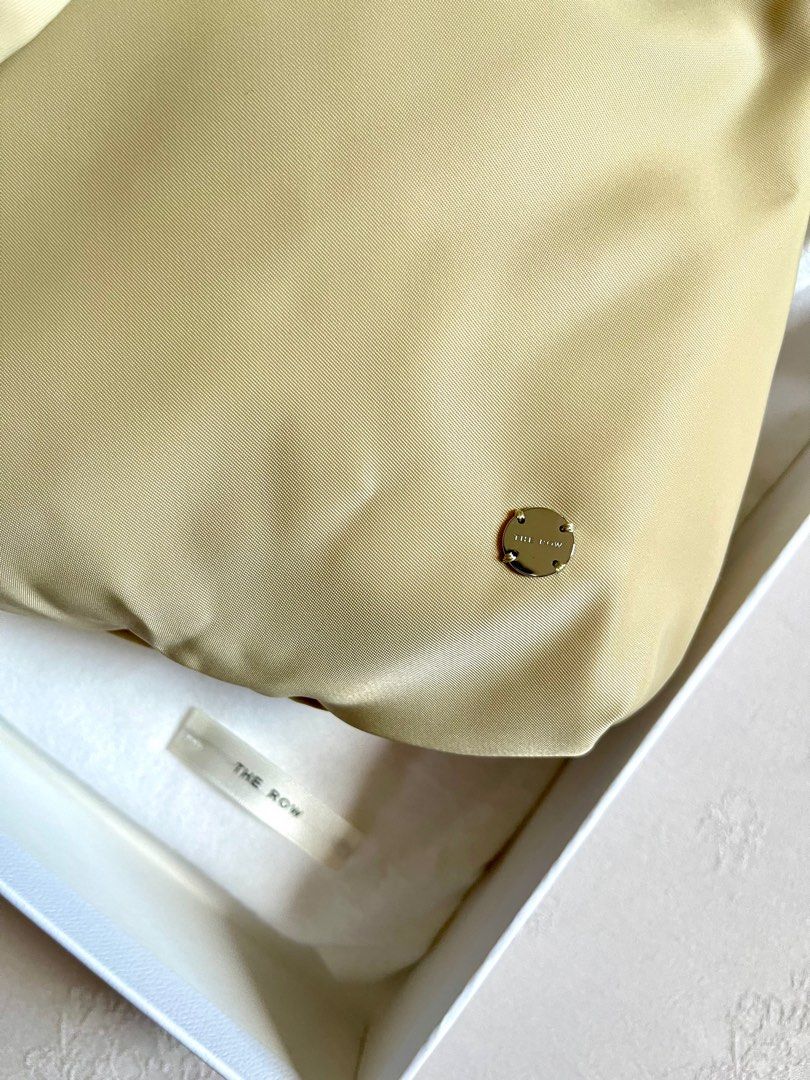 The Row Shoulder Bag in fabric (beige colour) (Category: Bags & Wallets) located in Singapore. Submitted by ooctxx (Listing ID 1333072894, Image 2). Description: The brand term as “quiet luxury” This luxury label was found in 2006 by American actresses Ashley Olsen and Mary-Kate Olsen. Size measurement : 33x26x3 cm Drawstring enclosure Fabric Beige in colour Comes with The Row box and dustbag Only used once. PM for fast deal price! .