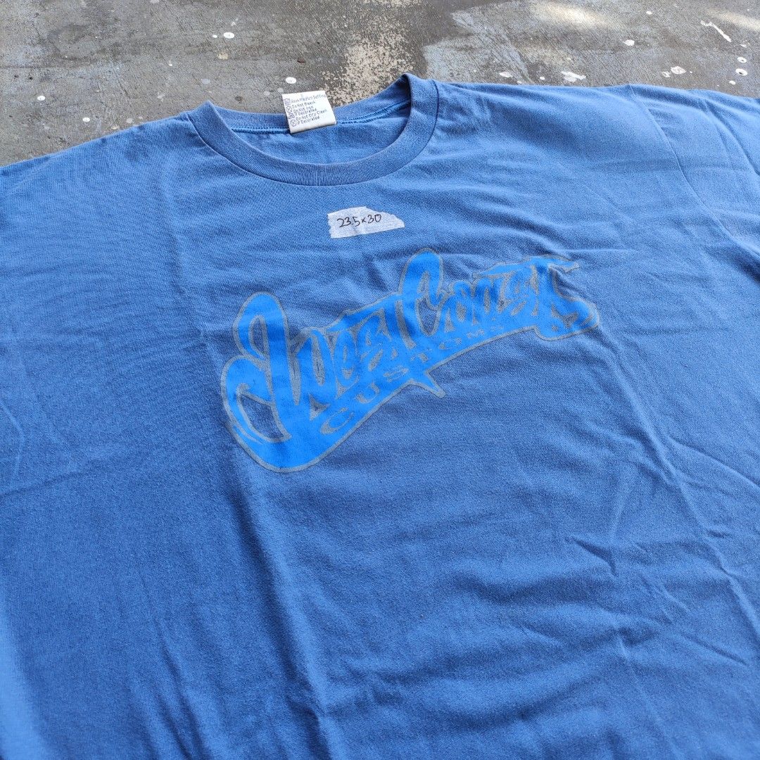 Vintage Punch Out Westcoast Customs (Category: Tshirts & Polo Shirts ) located in Quezon City. Submitted by junj0n (Listing ID 1333068192, Image 2). Description: Vintage Punch Out West Coast shirt XXL on tag L30 x W23.5 Condition: 10/10 issue: none needs wash ❗STRICTLY NO REFUND 📍Quezon City 📍Meetups: Betty Go / Sta. Mesa 🚚 Lalamove / JRS Express / LBC 📦 Shipping fee to be shouldered by the buyer.