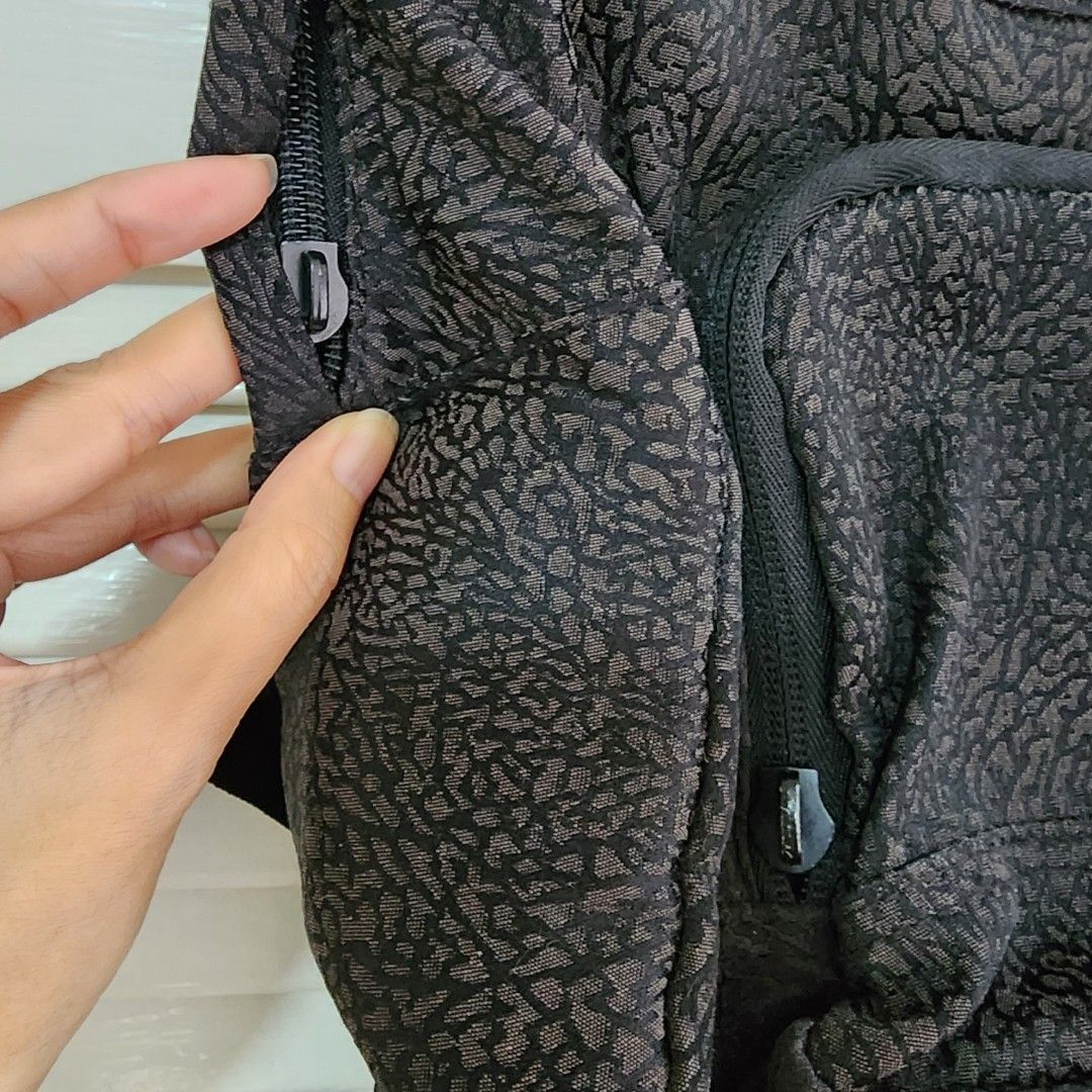 Air Jordan Mini Backpack (Category: Babies & Kids Fashion) located in Quezon City. Submitted by ShopPDplusK (Listing ID 1333170578, Image 3). Description: Brand: Air Jordan Size: Mini Backpack for kids Condition: Fairly used. Zipper pulls are missing but can be replaced at repair shops. RFS: Decluttering. SRP: 2000 PhP Delivery Fees and Pick up arrangements to be made by buyer. (Mira Nila Homes, Quezon City) I only ship to provinces using GoGoX. 