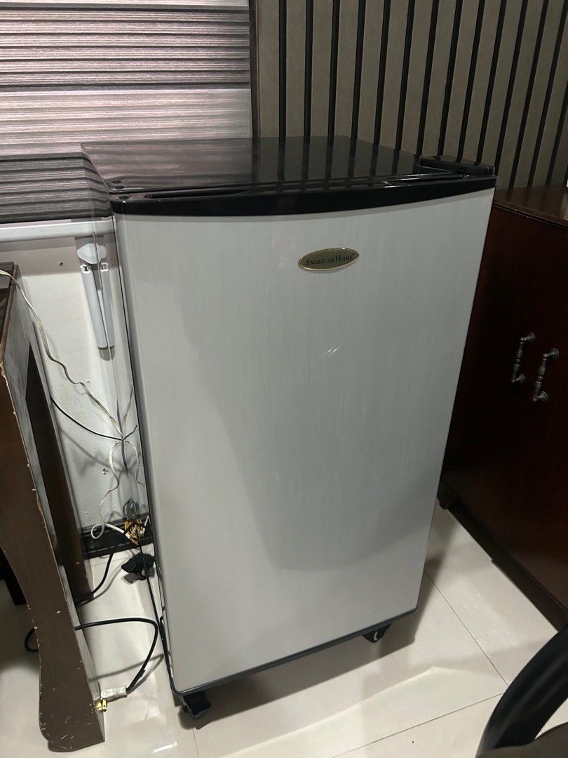 American Home Personal Bar Refrigerator (Category: Refrigerators and Freezers) located in San Fernando. Submitted by thriftcsfp (Listing ID 1333202515, Image 1). Description: American Home Refrigerator Model ABR-92G Still looks new/clean and used with care, chiller and freezer are working well. slight issue is rubber lining in the door is quite loose but very fixable. For pickup only at San Fernando Pampanga .