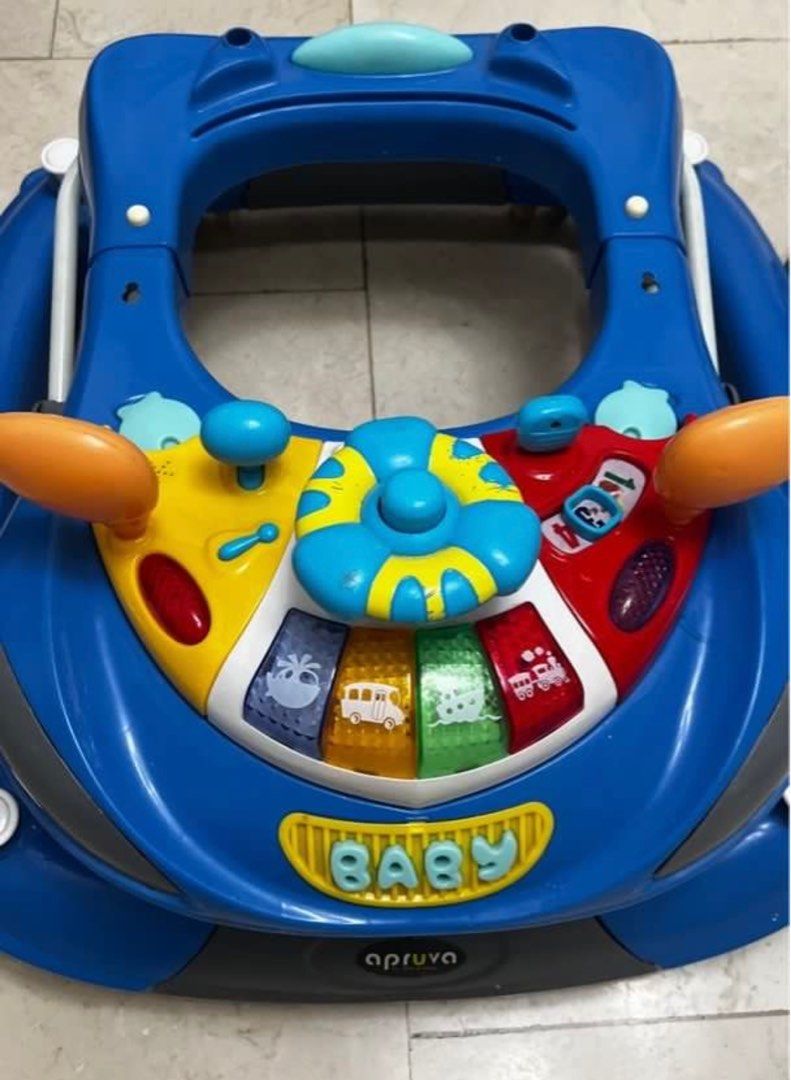 Apruva 2 in 1 Walker (Category: Infant Playtime) located in Quezon City. Submitted by piacakes (Listing ID 1333252618, Image 1). Description: used less than a month then stored selling for 1800, was bought for 3799 at baby company Loc Cubao.