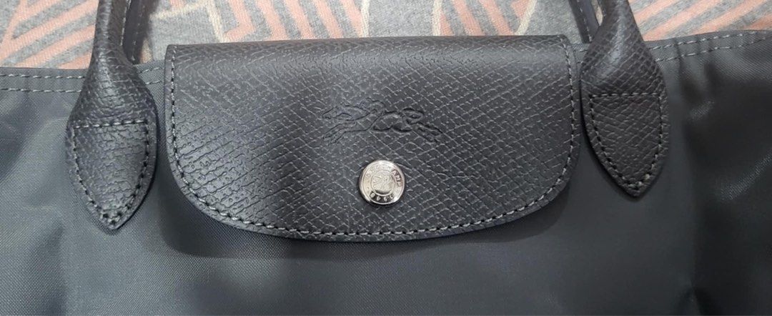 AUTHENTIC LONGCHAMP SMALL SHORT HANDLE IN GRAPHITE (Category: Luxury Bags & Wallets) located in Manila. Submitted by stuffcartph (Listing ID 1333207874, Image 2). Description: 100% AUTHENTIC LONGCHAMP SMALL SHORT HANDLE IN GRAPHITE .