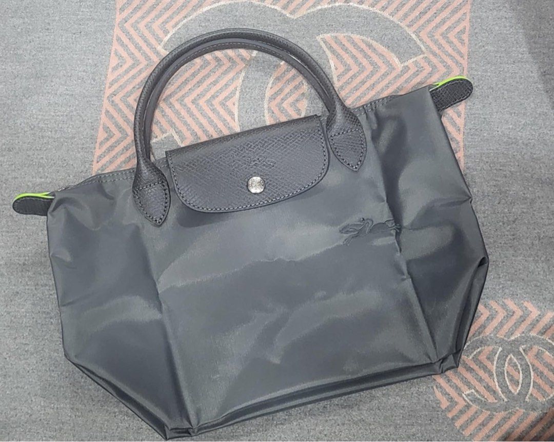 AUTHENTIC LONGCHAMP SMALL SHORT HANDLE IN GRAPHITE (Category: Luxury Bags & Wallets) located in Manila. Submitted by stuffcartph (Listing ID 1333207874, Image 1). Description: 100% AUTHENTIC LONGCHAMP SMALL SHORT HANDLE IN GRAPHITE .