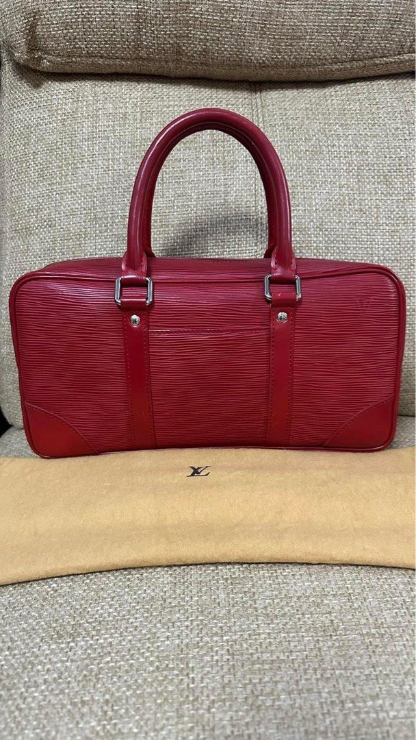 Authentic Louis Vuitton (Category: Luxury Bags & Wallets) located in Manila. Submitted by chloe_luxuries (Listing ID 1333217816, Image 1). Description: Guaranteed original Louis Vuitton Vivienne Epi long handbag Small size close to med. Very good condition Comes with dustbag Pm for more details .
