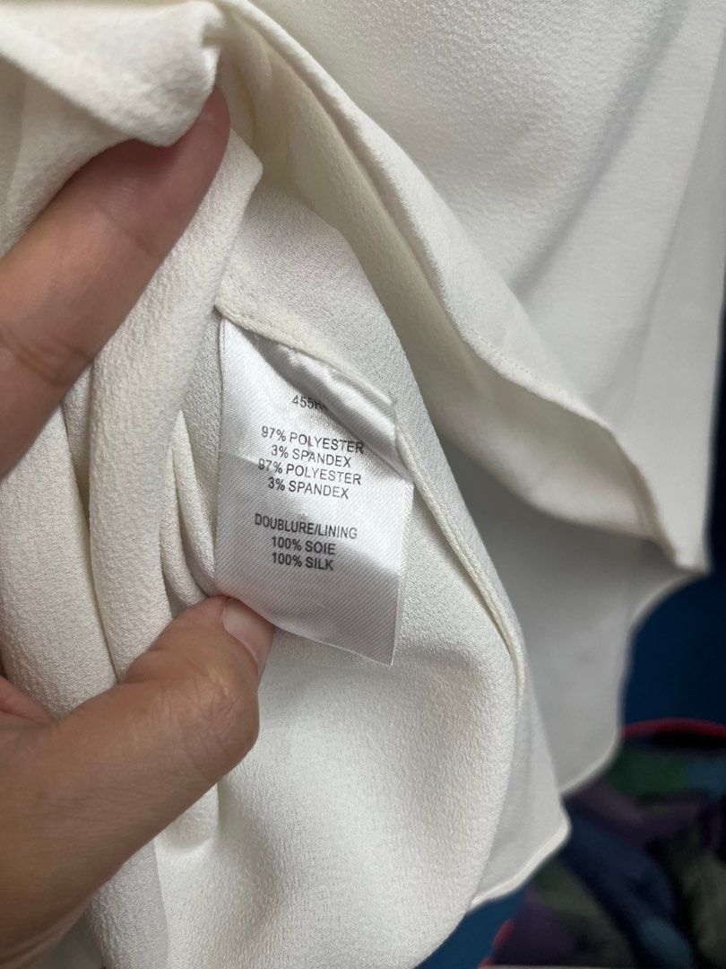 Carven White Longsleeve Blouse/Top (Category: Blouses) located in Quezon City. Submitted by wednesday21 (Listing ID 1333215280, Image 3). Description: Carven white blouse with slightly puffed long sleeves. Crepe fabric with pleated design in front and concealed zipper at the back..