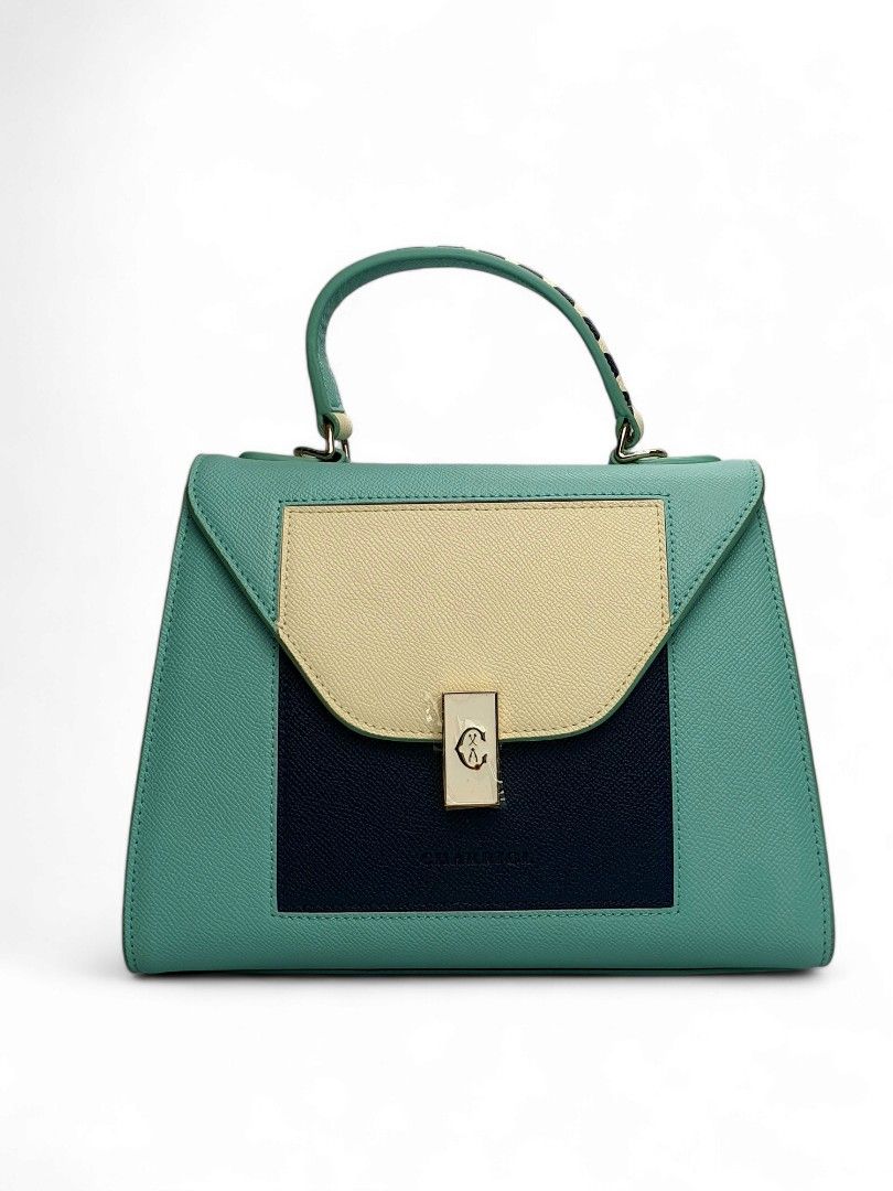 Charriol handbag (Category: Luxury Bags & Wallets) located in Manila. Submitted by cheng23 (Listing ID 1333174027, Image 1). Description: Charriol Le Reve handbag tiffany blue/navy leather comes with dust bag,tag,paper bag dimensions: 20.8x20.5x13.