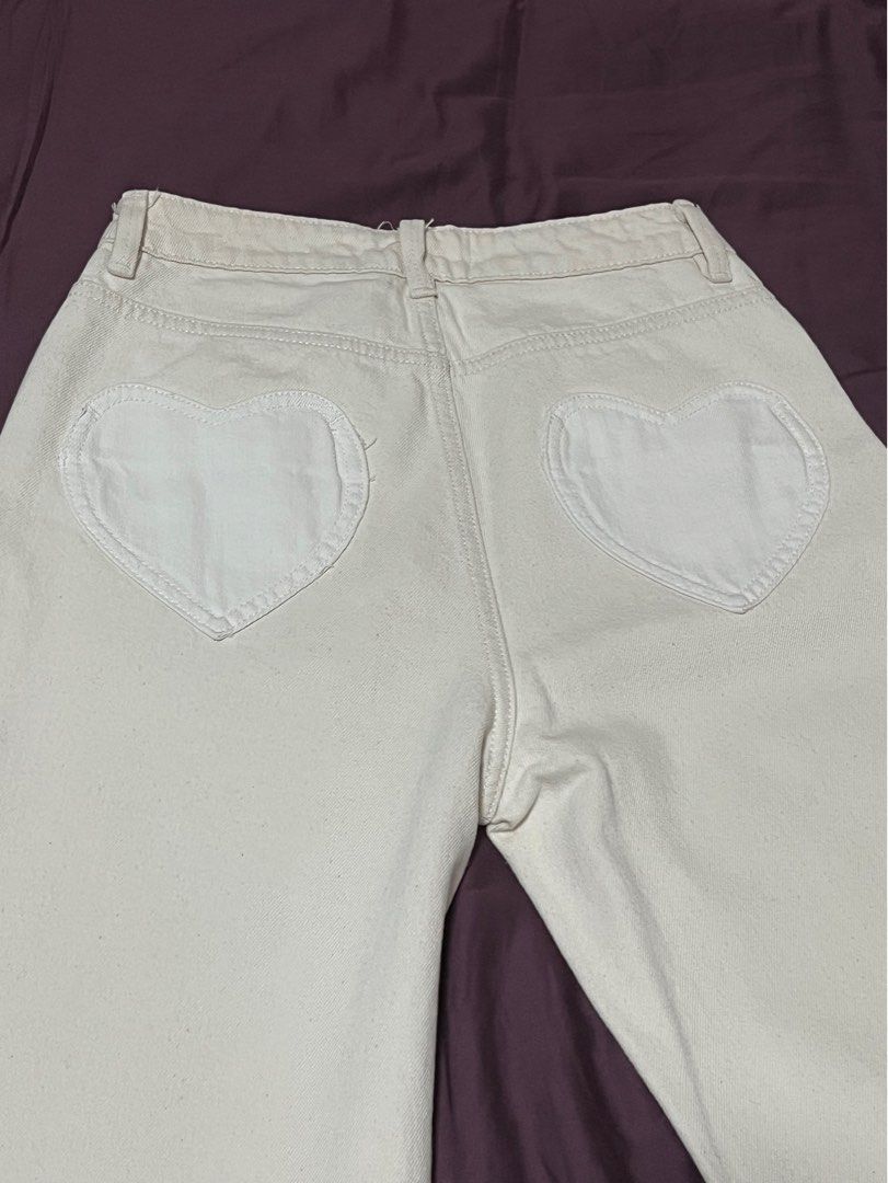 Cream White Jeans with Heart Pocket (Category: Jeans) located in Paranaque City. Submitted by shopmnp (Listing ID 1333226204, Image 2). Description: Super cute jeans with heart shaped back pockets Size: 25 on label Length: 39.5 in Worn twice only.