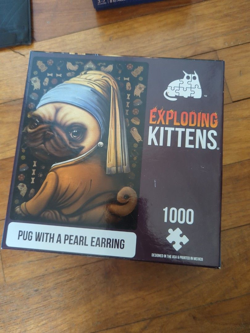 Exploding kittens jigsaw puzzle (Category: Board Games & Puzzles) located in Singapore. Submitted by ossairus (Listing ID 1333230141, Image 1). Description: mint condition.
