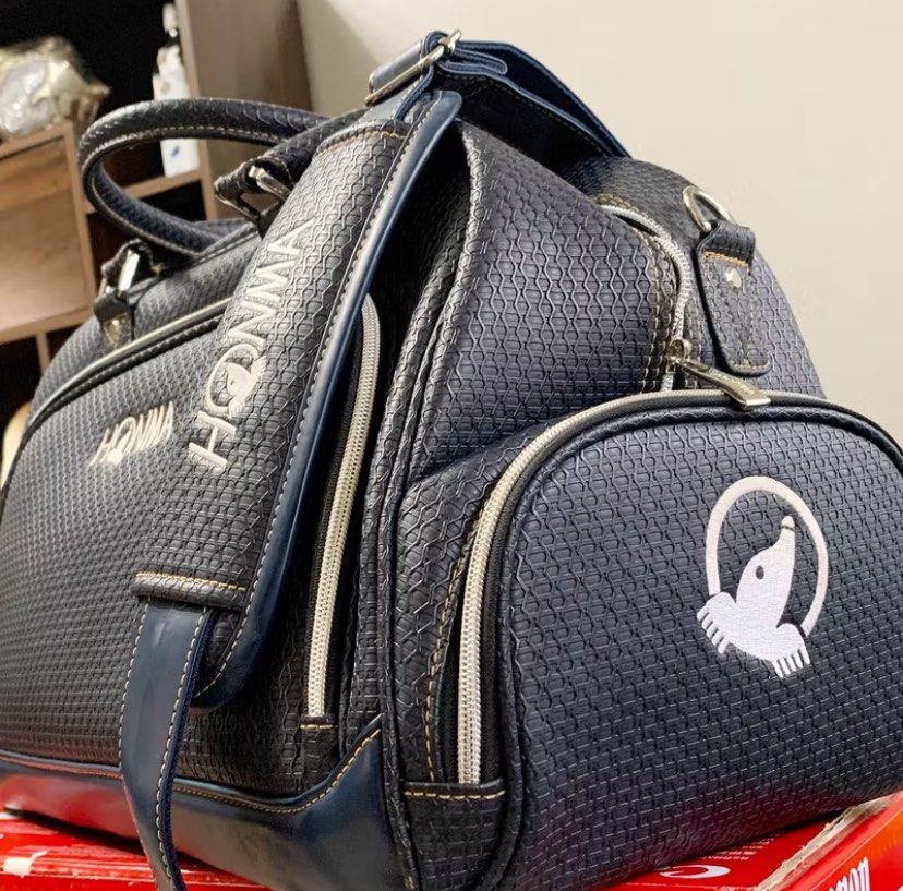 Golf Bag Honma Boston Bag Duffle Bag (Category: Golf) located in Cavite. Submitted by vieanner (Listing ID 1331601897, Image 1). Description: Brand New Honma Bag - Never Used This bag has never been used, but it has been in storage for some time. As a result, there are minor imperfections, specifically some wear on the exterior. These flaws are purely cosmetic and do not affect the bag’s functionality or overall quality. Please refer to the photo