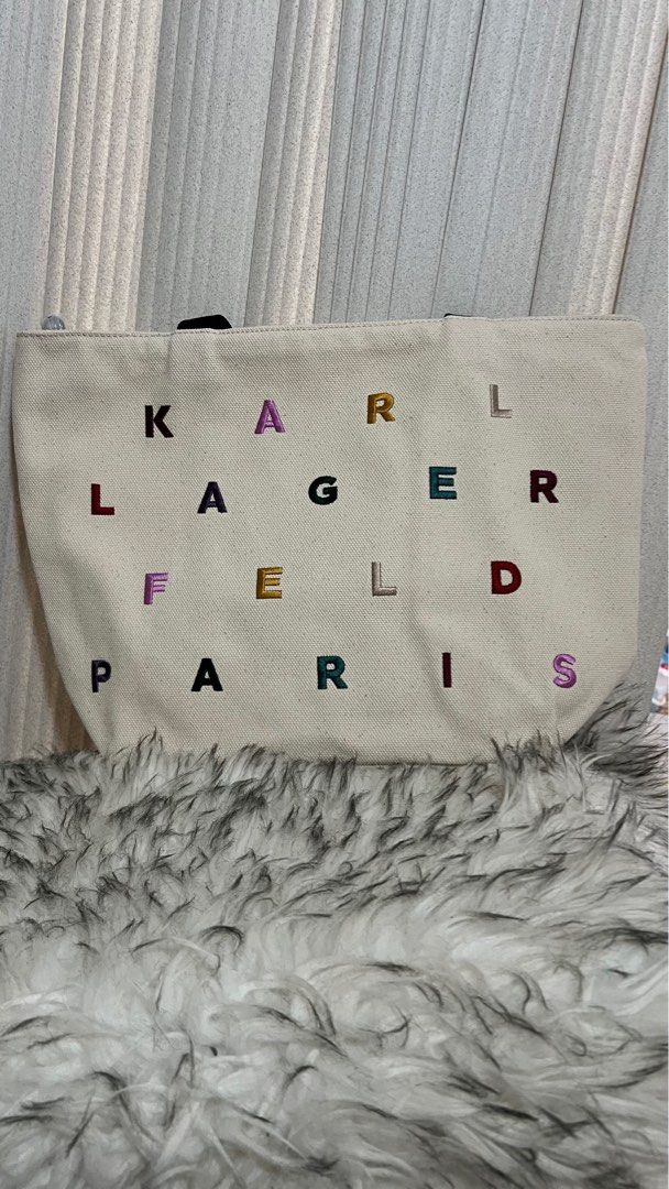 Karl Lagerfeld Canvas Tote (medium) (Category: Tote Bags) located in Cavite. Submitted by everythingnicehere (Listing ID 1333176271, Image 3). Description: ✅ Genuine original 💯 imported from US🇺🇸 ✅ On hand 🇵🇭; Ready to ship Product details: COTTON TOP ZIP CLOSURE INTERIOR: 1 INSIDE SLIP POCKET DOUBLE TOP HANDLE 8" HANDLE DROP 18" x 12" X 9" NOTE: Payment first before item can be shipped. ❗️Disclaimer: We are NOT Associated or Affiliated with