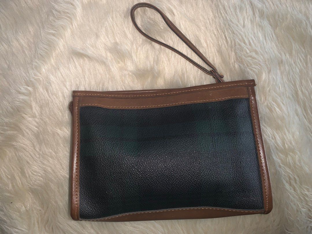 leather clutch handbag (Category: Wallets & Card holders) located in Manila. Submitted by rurusaid (Listing ID 1333194478, Image 2). Description: not sure about the brand flaws: yung color underneath (in pics) leather length: 6in witdth: 8.5 in.