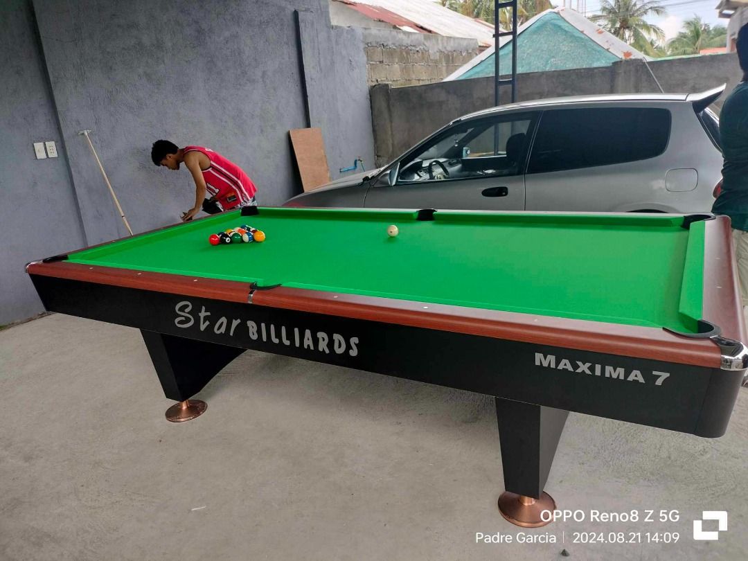 Maxima 7 Billiard Table (Category: Billiards and Bowling) located in San Pablo. Submitted by reyesbilliardsandaccessories_ (Listing ID 1333172142, Image 1). Description: MAXIMA 7 BILLIARD TABLE 🎱SPECIFICATIONS: ✔Size: 5x9ft (Tournament) ✔Slate: Granite ✔Cushion: Uylin ✔Corner Pocket: Metal ✔Side corner Pocket: Hard Plastic ✔Pocket: Manual 🎱ACCESSORIES INCLUDED: ✔ANDY 600 WITH WHITE CLOTH ✔ARAMITH PREMIUM BILLIARD BALL SET ✔MANUAL BILLIARD POCKE
