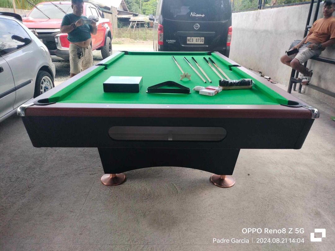 Maxima 7 Billiard Table (Category: Billiards and Bowling) located in San Pablo. Submitted by reyesbilliardsandaccessories_ (Listing ID 1333172142, Image 2). Description: MAXIMA 7 BILLIARD TABLE 🎱SPECIFICATIONS: ✔Size: 5x9ft (Tournament) ✔Slate: Granite ✔Cushion: Uylin ✔Corner Pocket: Metal ✔Side corner Pocket: Hard Plastic ✔Pocket: Manual 🎱ACCESSORIES INCLUDED: ✔ANDY 600 WITH WHITE CLOTH ✔ARAMITH PREMIUM BILLIARD BALL SET ✔MANUAL BILLIARD POCKE