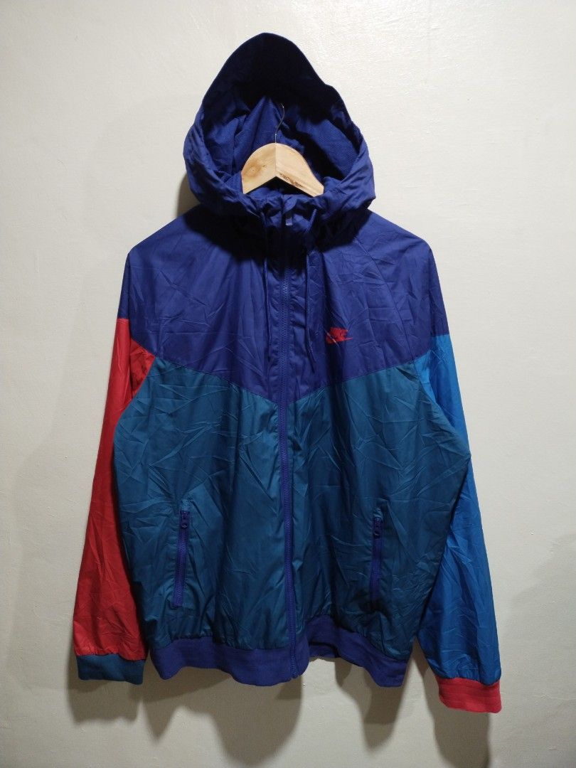NIKE Sportswear Tritone Windbreaker (Category: Coats, Jackets and Outerwear) located in Mandaluyong City. Submitted by lcfl1014 (Listing ID 1333290789, Image 1). Description: 📌NIKE Sportswear Tritone WIndbreaker Tela: Windbreaker Size: XL on tag. 25inches width, 27.5inches length Color: Blue+Green+Red. 9.8/10 Condition: 9.8/10 no issues Delivery: Sho.p.ee COD, Lalamove, J&T Location: Namayan, Mandaluyong.