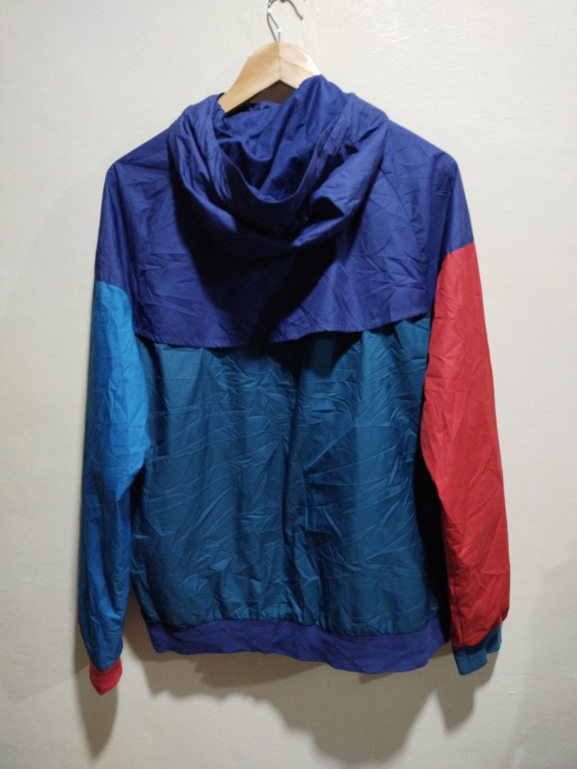 NIKE Sportswear Tritone Windbreaker (Category: Coats, Jackets and Outerwear) located in Mandaluyong City. Submitted by lcfl1014 (Listing ID 1333290789, Image 2). Description: 📌NIKE Sportswear Tritone WIndbreaker Tela: Windbreaker Size: XL on tag. 25inches width, 27.5inches length Color: Blue+Green+Red. 9.8/10 Condition: 9.8/10 no issues Delivery: Sho.p.ee COD, Lalamove, J&T Location: Namayan, Mandaluyong.