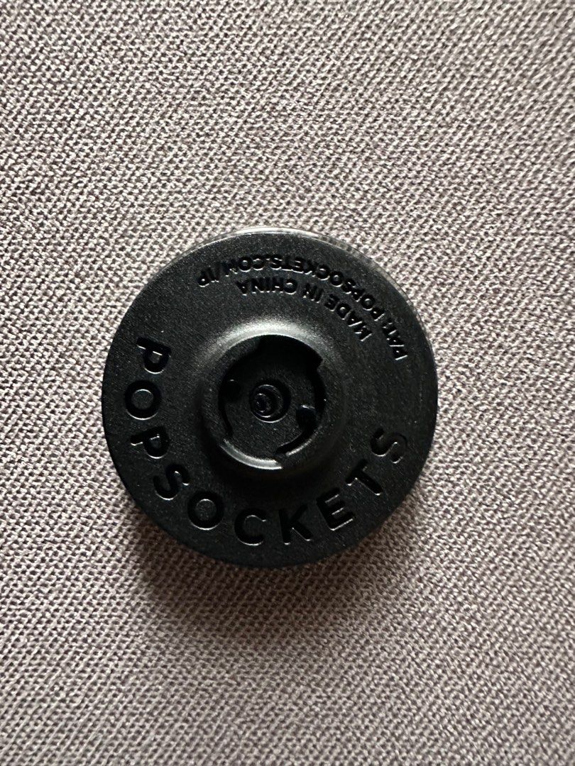 PopSockets Black PopGrip Phone Ring Holder (Category: Mounts & Holders) located in Las Pinas. Submitted by seektoshop (Listing ID 1333260854, Image 2). Description: Color: Translucent Black Smoke *adhesive not included Removable too to wirelessly charge phone Secure grip so you can text with one hand Functions as a convenient stand so you can watch videos .
