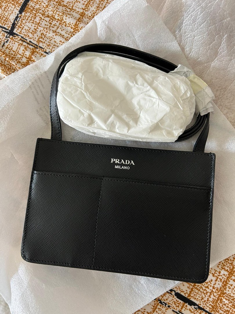 Prada saffiano phone sling bag. Luxury Bags Wallets on Carousell