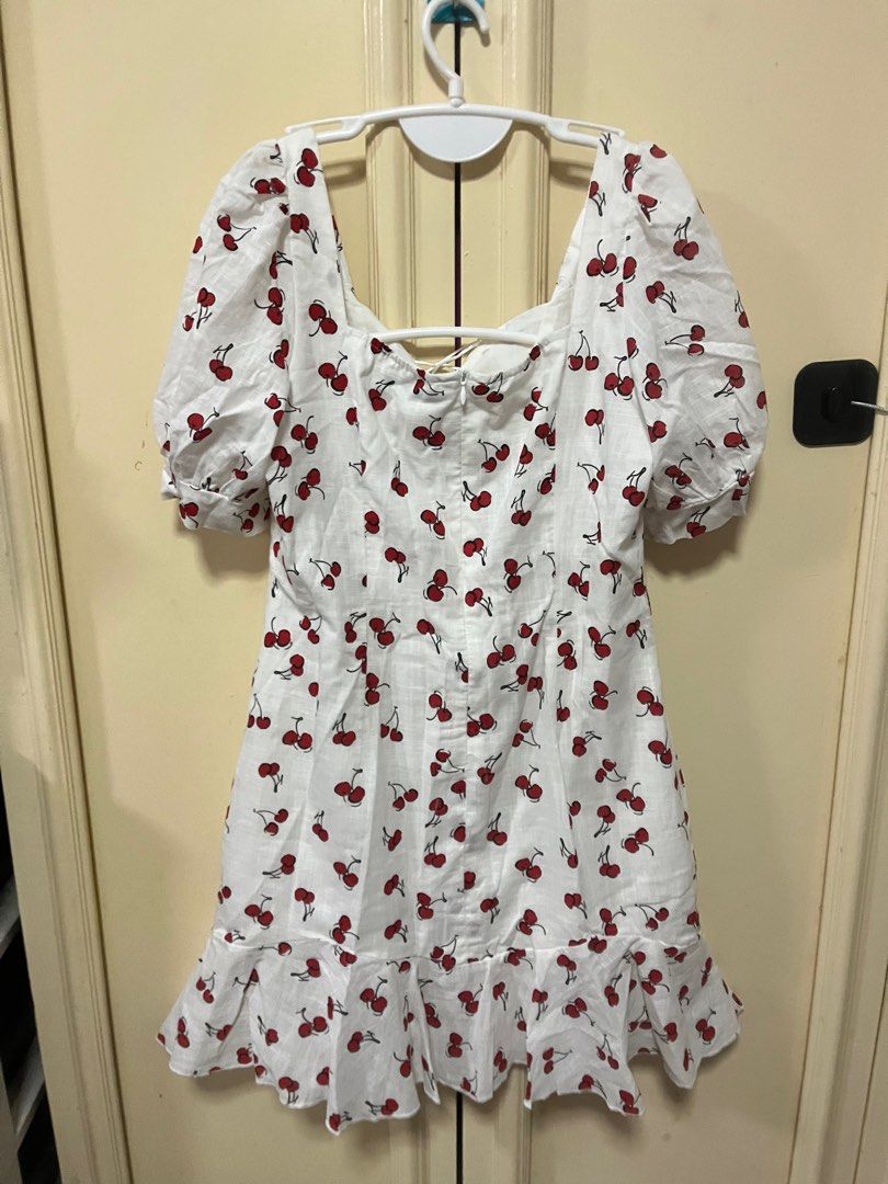 Shein White Cherry Dress (Category: Dresses) located in Makati City. Submitted by frelbv (Listing ID 1333196573, Image 2). Description: Used once. No longer fits me Can be bought as 900 with 2 other items priced 350.