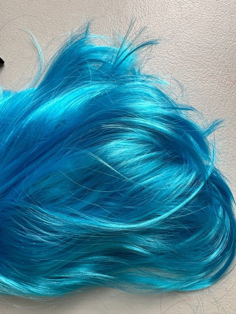 Short Hair Wig Skyblue (Category: Hair) located in Taguig. Submitted by kmtshops (Listing ID 1333218298, Image 1). Description: Short \ above the shoulder For adults Kids can also wear this since it’s garterized 📍BGC Taguig.