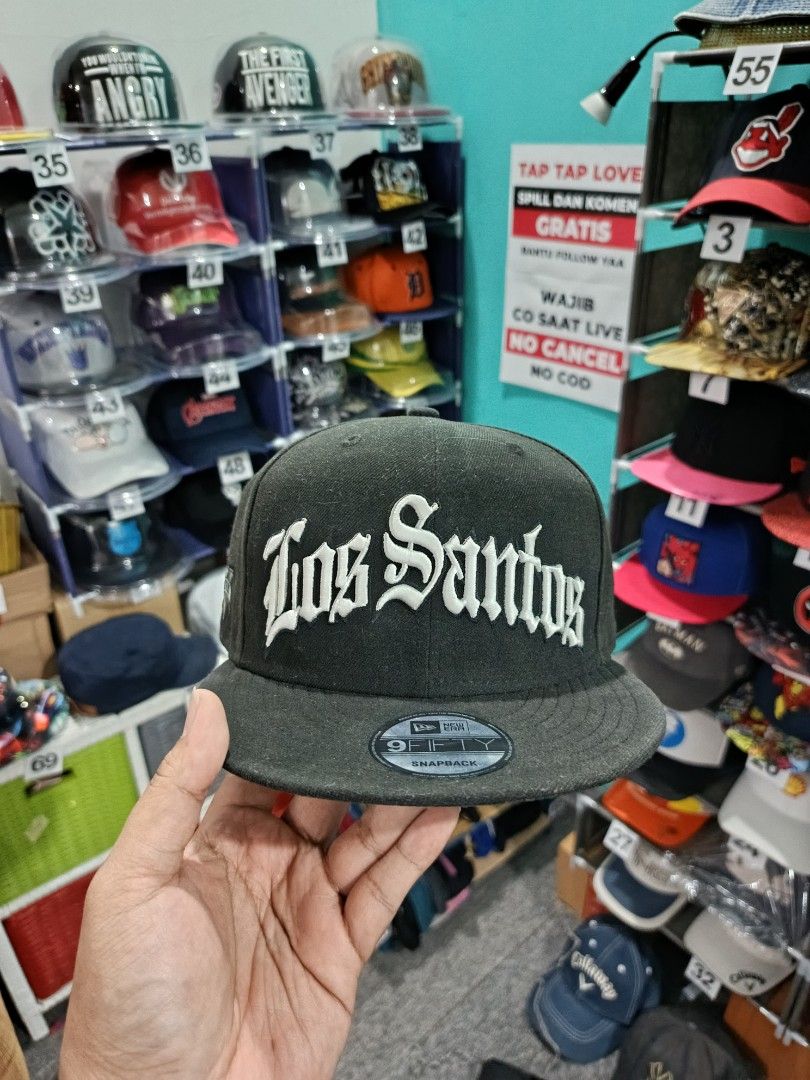 Snapback New Era X GTA V X Rockstar Games Los Santos Big Script Fesyen Pria Aksesoris Topi di Carousell
