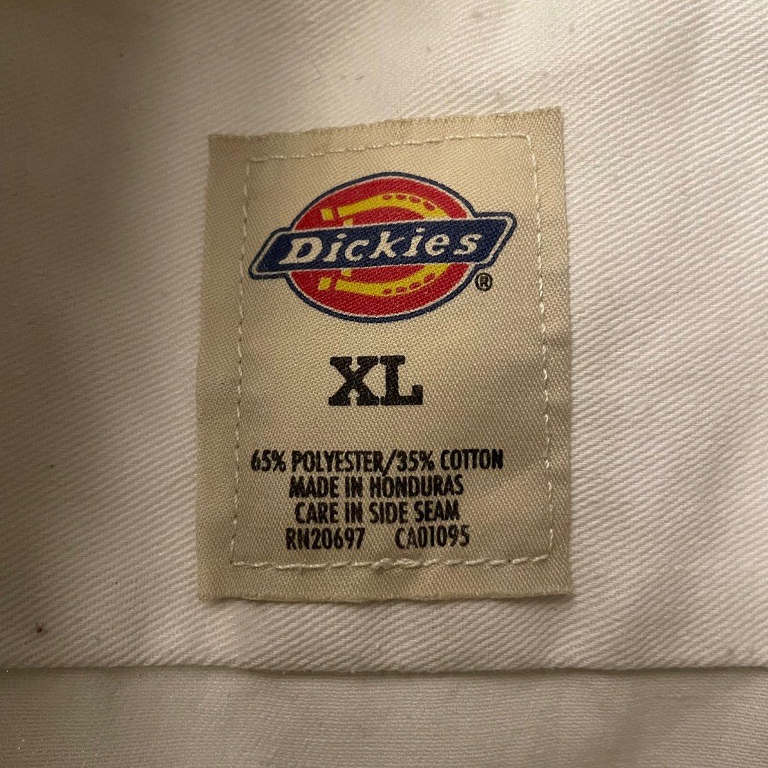Vintage Dickies Utility Polo Workwear (Category: Others Tops) located in Quezon City. Submitted by emporium.vtg (Listing ID 1333241987, Image 2). Description: Vintage Dickies Utility Polo Workwear Dickies Tag Size XL Dimensions: 25.5”x32” Issue: dirt stains.