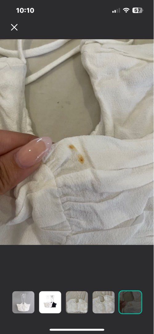 White Halter top (Category: Others Tops) located in Malabon City. Submitted by spamwithegg (Listing ID 1333290431, Image 3). Description: Stain is removable .