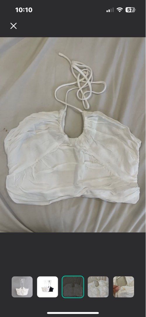 White Halter top (Category: Others Tops) located in Malabon City. Submitted by spamwithegg (Listing ID 1333290431, Image 2). Description: Stain is removable .