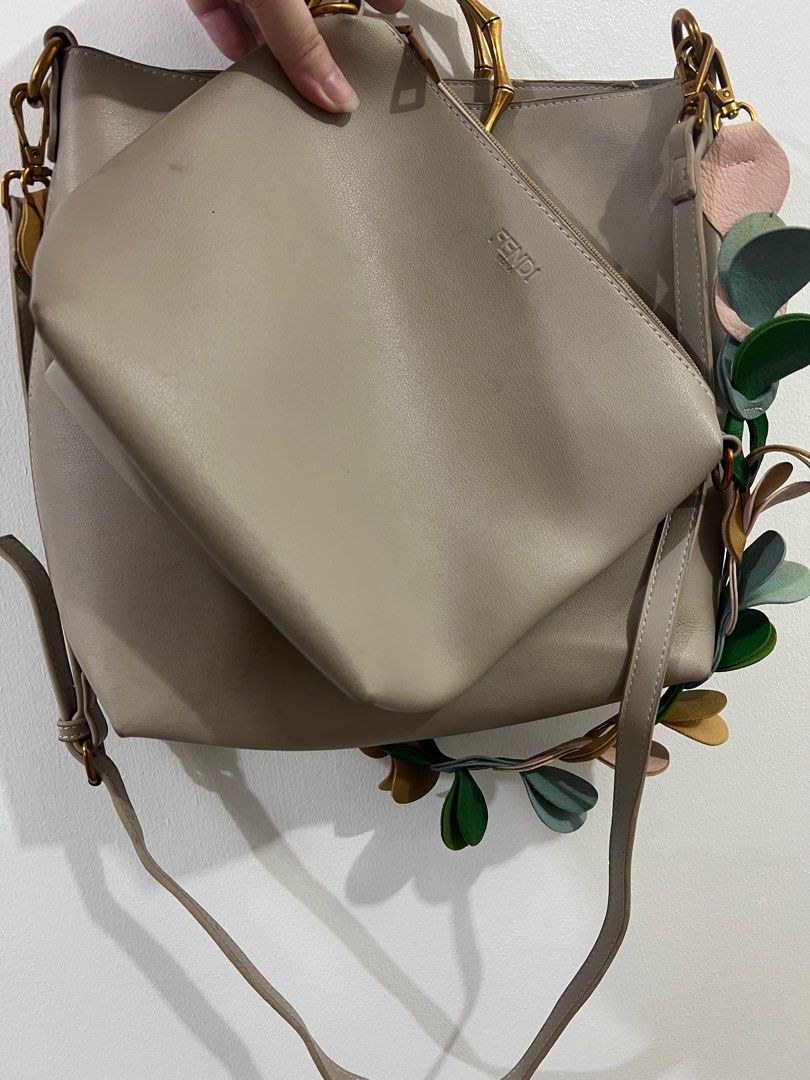 Fendi bag (Category: Luxury Bags & Wallets) located in Makati City. Submitted by maltitalibrary (Listing ID 1333393795, Image 3). Description: Fendi bag 2 in 1 bag The pouch can be converted into a kili bag or sling bag Issue May stain sa loob (not sure if you can remove it) There are some dirts and small stain outside of the bag (can give more photos).