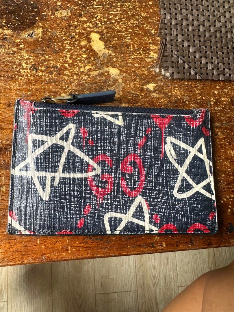 Gucci ghost pouch deals