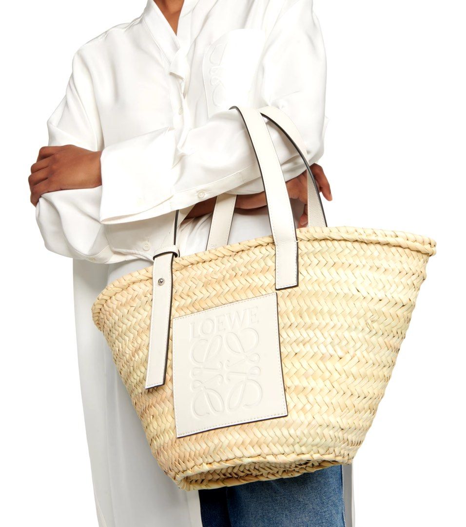 Pasabuy! Loewe Large Raffia Bag in White (Category: Luxury Bags & Wallets) located in Quezon City. Submitted by everybit (Listing ID 1333402697, Image 1). Description: - Brand new and Authentic (Will be bought directly from Stores) - Inclusions: Receipt, Dust Bag, and Tags in tact (I provide everything) - ETA: 4-5 weeks - Only 50% downpayment, remaining will be settled once item is in PH - Super steal price! Note: All of the items posted are subj