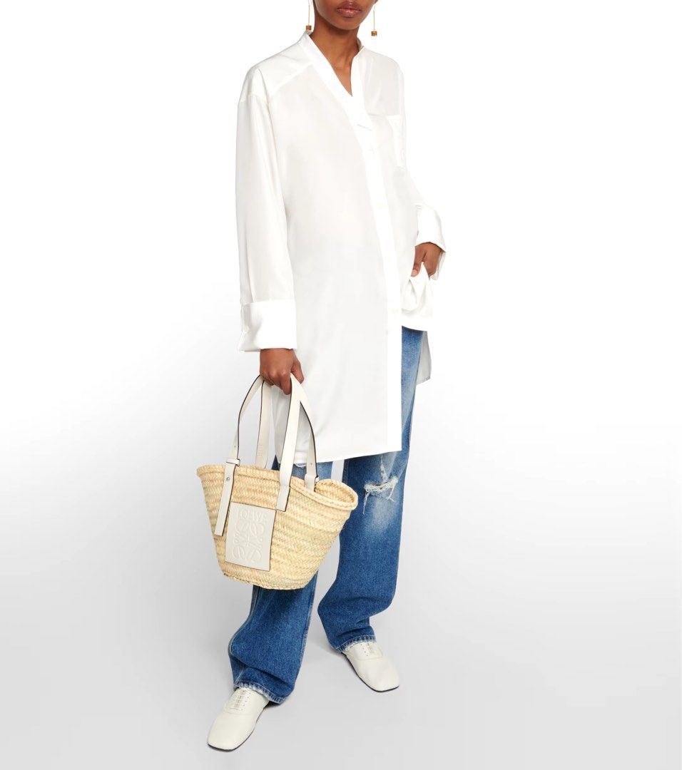 Pasabuy! Loewe Large Raffia Bag in White (Category: Luxury Bags & Wallets) located in Quezon City. Submitted by everybit (Listing ID 1333402697, Image 3). Description: - Brand new and Authentic (Will be bought directly from Stores) - Inclusions: Receipt, Dust Bag, and Tags in tact (I provide everything) - ETA: 4-5 weeks - Only 50% downpayment, remaining will be settled once item is in PH - Super steal price! Note: All of the items posted are subj
