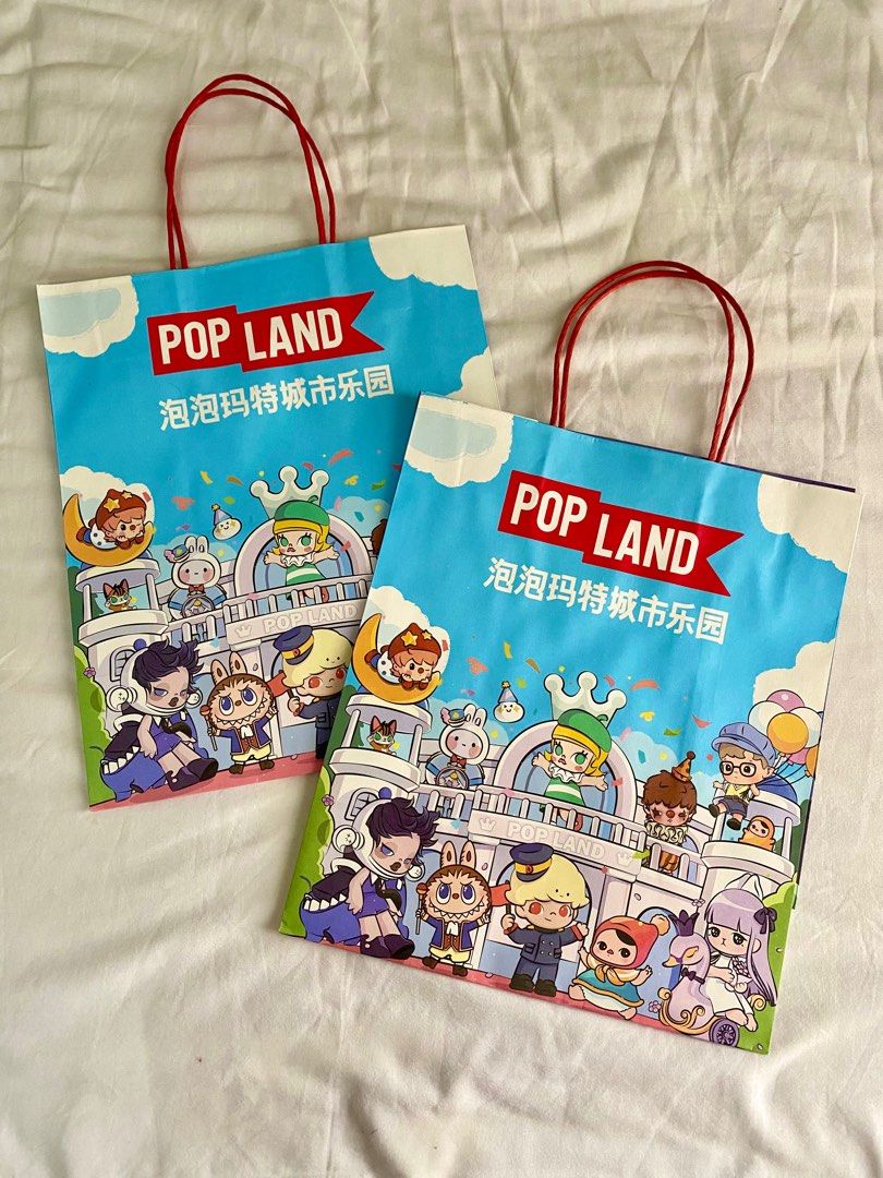 Pop Land exclusive paperbags (Category: Belt bags, Clutches and Pouches) located in Pasig City. Submitted by jdlmnl (Listing ID 1333382056, Image 1). Description: Pop Land Beijing exclusive paper bags Small W 27cm x H 32cm (1 available) Big W 45cm x H 35cm (2 available) RFS: Decluttering Also selling Pop Land exclusive Labubu keychain (see profile).