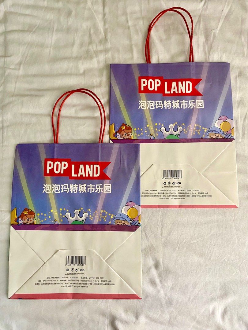 Pop Land exclusive paperbags (Category: Belt bags, Clutches and Pouches) located in Pasig City. Submitted by jdlmnl (Listing ID 1333382056, Image 2). Description: Pop Land Beijing exclusive paper bags Small W 27cm x H 32cm (1 available) Big W 45cm x H 35cm (2 available) RFS: Decluttering Also selling Pop Land exclusive Labubu keychain (see profile).