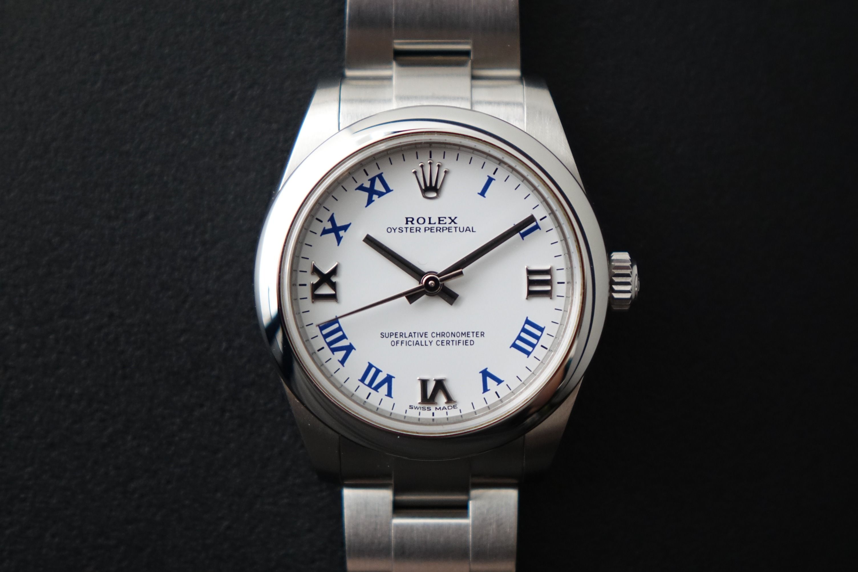 Rolex Oyster Perpetual 31 177200-0016 White Roman full set (Category: Watches) located in Singapore. Submitted by wristime (Listing ID 1333467735, Image 1). Description: Join our tele channel for the latest updates and exclusive deals! t.me/wristime Discontinued model in Pristine Condition. Comes with Box, Papers, Card Holder, Booklet and matching serial tag Brand: Rolex Reference: 177200-0016 Comes with: Box, Papers, Card holder, Booklets, Match