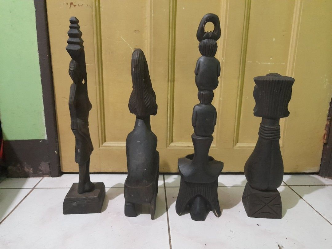 4 wooden tribal figures (Category: Other Home Decor) located in Quezon City. Submitted by verybountiful (Listing ID 1328918390, Image 3). Description: Price for the lot of 4. Has minor imperfections. Pick up in Diliman, Quezon City or by courier on buyer's account and risk. MOP RCBC, Landbank or gcash. No long reservations, please..