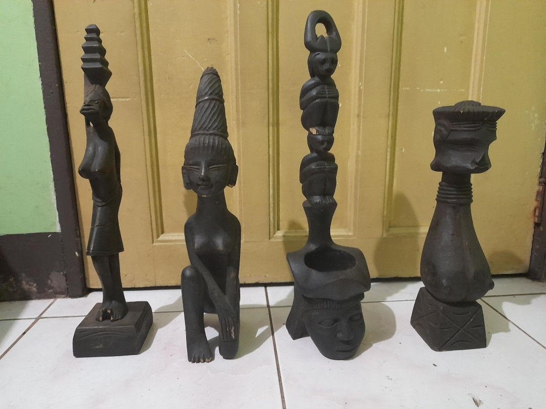 4 wooden tribal figures (Category: Other Home Decor) located in Quezon City. Submitted by verybountiful (Listing ID 1328918390, Image 1). Description: Price for the lot of 4. Has minor imperfections. Pick up in Diliman, Quezon City or by courier on buyer's account and risk. MOP RCBC, Landbank or gcash. No long reservations, please..