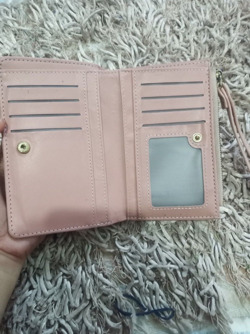 BENCH BIFOLD WALLET (Category: Wallets & Card holders) located in Cavite. Submitted by imdgrce (Listing ID 1328851235, Image 2). Description: NO FLAWS SIGNS OF USAGE, BUT GOOD AS BRAND NEW.
