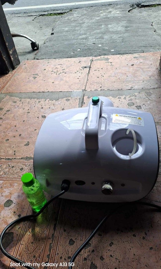 DISINFECTING FOG MACHINE (Category: Air Purifiers & Dehumidifiers) located in Pasig City. Submitted by graceellaolshope (Listing ID 1328855321, Image 3). Description: 🔫𝐃𝐈𝐒𝐈𝐍𝐅𝐄𝐂𝐓𝐈𝐍𝐆 𝐅𝐎𝐆 𝐌𝐀𝐂𝐇𝐈𝐍𝐄: 𝐓𝐡𝐞 𝐔𝐥𝐭𝐢𝐦𝐚𝐭𝐞 𝐒𝐚𝐧𝐢𝐭𝐢𝐳𝐢𝐧𝐠 𝐒𝐨𝐥𝐮𝐭𝐢𝐨𝐧** 🏷️ Price : 1,300 2L solution ---650 A powerful tool designed to effectively sanitize and eliminate odors in YOUR :👇 🚗 CAR 🏡 HOUSE 🏢OFFICE ✅ STORE 🦠Disinfect and ki