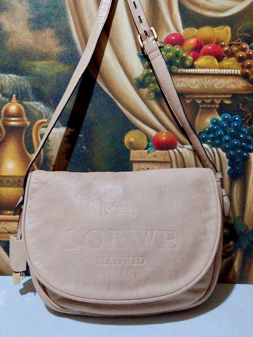 Leowe Madrid Shoulder Bag (Category: Luxury Bags & Wallets) located in Muntinlupa City. Submitted by phbudgetluxuryfinds (Listing ID 1328796096, Image 1). Description: Authentic Loewe Bag Shiny gold hardwares Clean interior .